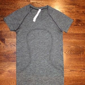 dark green weathered Lululemon swiftly tech tank top